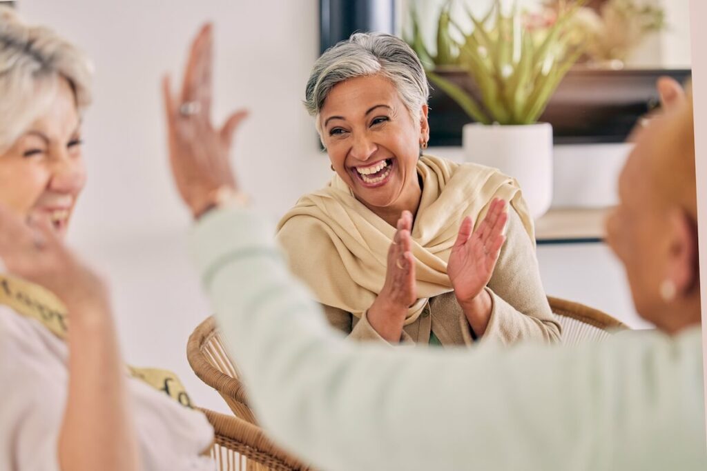 Group of joyful older adults having a good time together