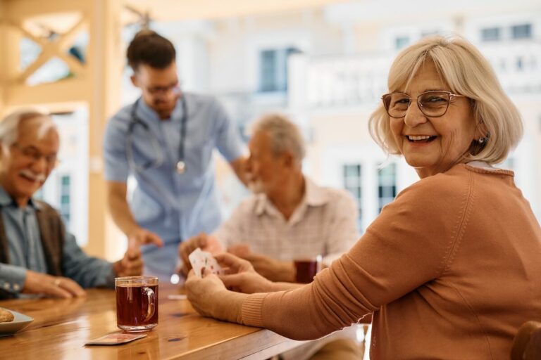 Older woman happily hanging out with senior friends.